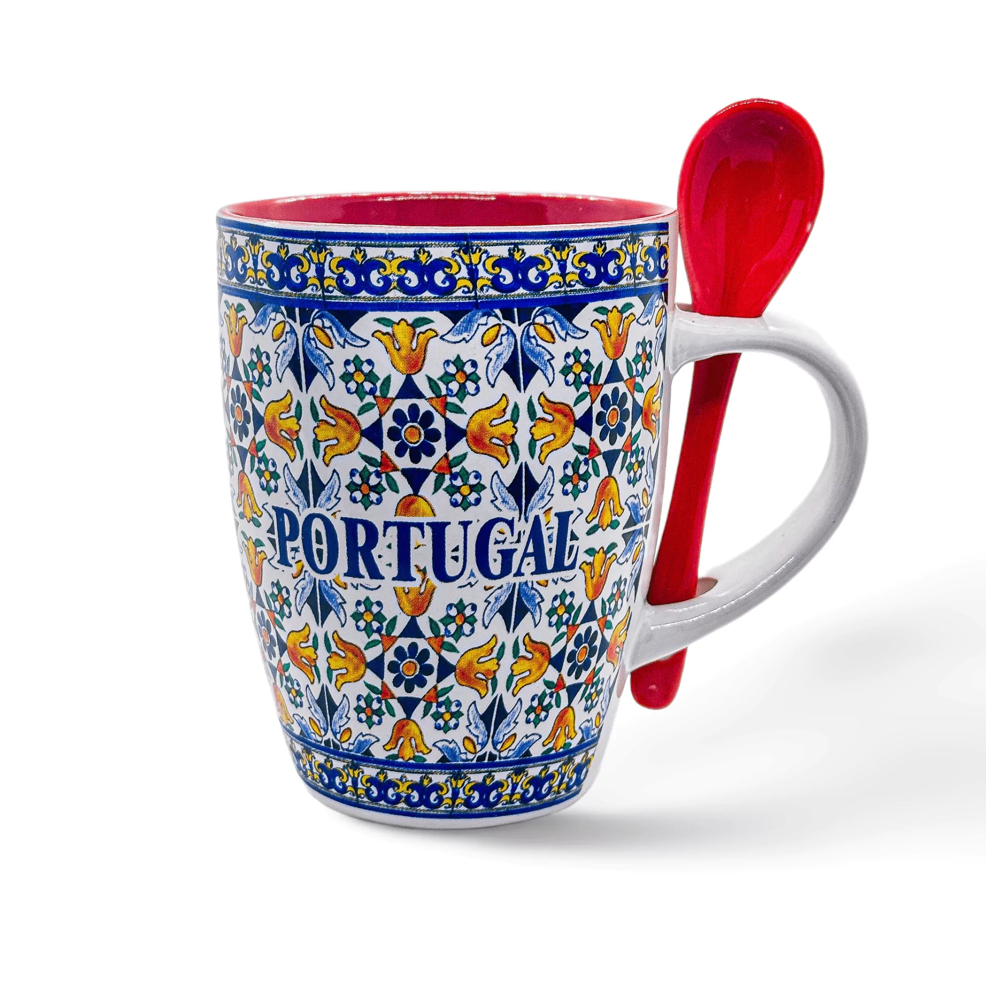 A decorative ceramic coffee mug with intricate colorful floral patterns reminiscent of traditional tile design and the word "PORTUGAL" in blue letters. This souvenir features a red interior and comes with a matching red spoon inserted through the handle.