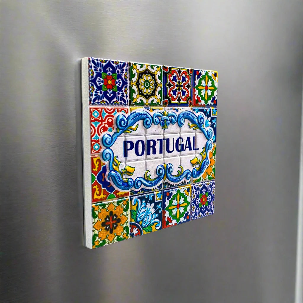 A beautifully crafted tile magnet showcasing vibrant patterns inspired by traditional Portuguese azulejo designs. At its center, the word "PORTUGAL" is displayed in bold blue letters, framed by an ornate blue and white border, and surrounded by intricate floral and geometric motifs. An ideal keepsake for collectors.
