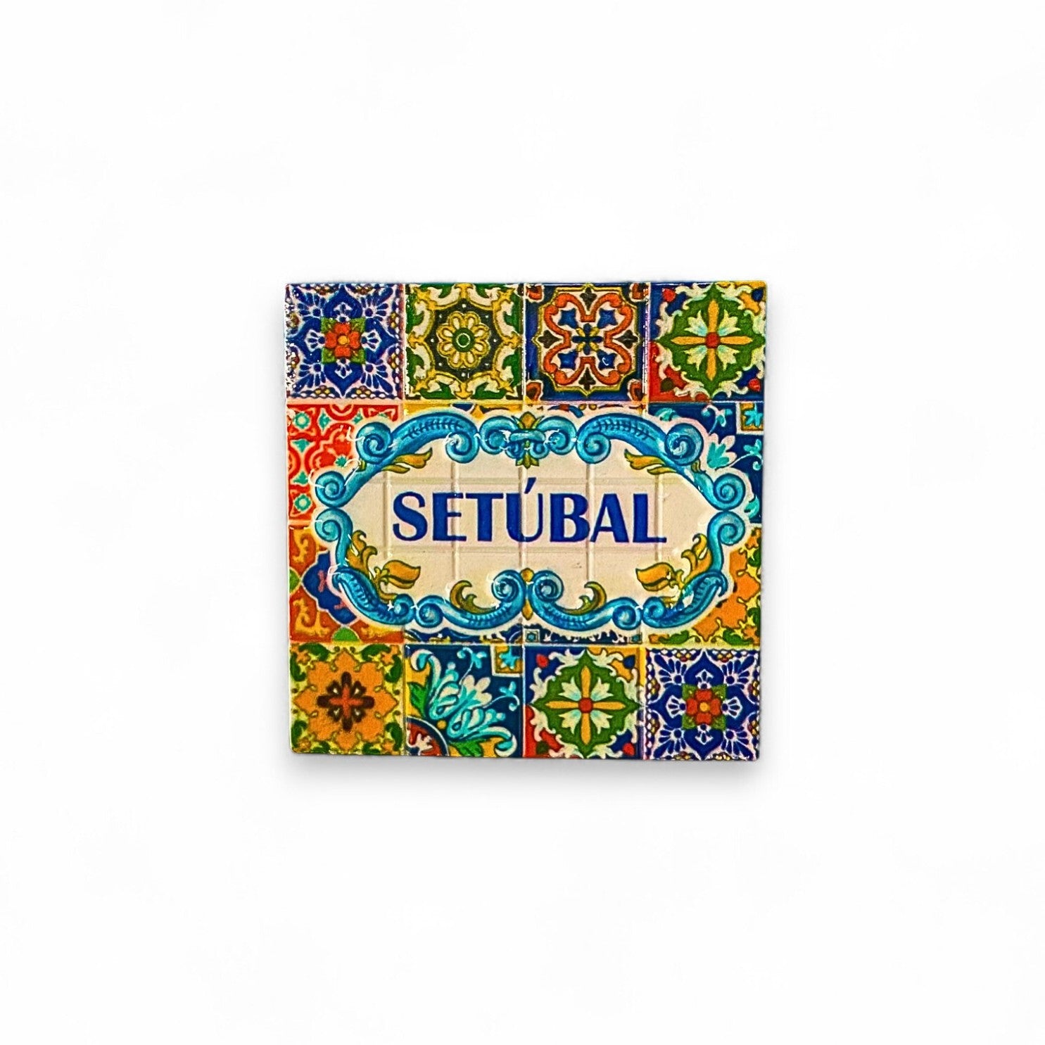 A square-shaped fridge magnet featuring a colorful Portuguese tile pattern with the word 'SETUBAL' in the center.
