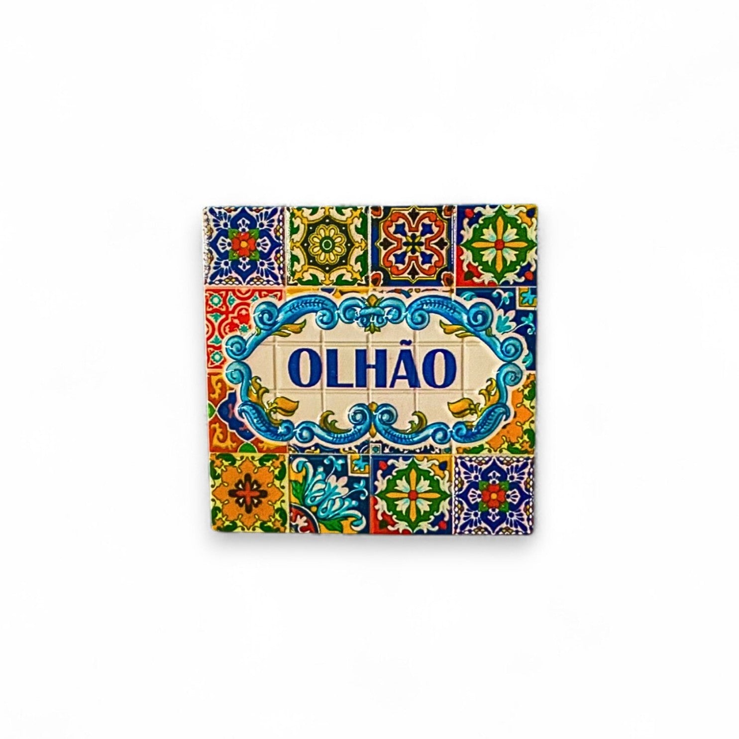 A colorful square fridge magnet with Portuguese tile patterns and the word 'OLHÃO' in bold letters in the center.