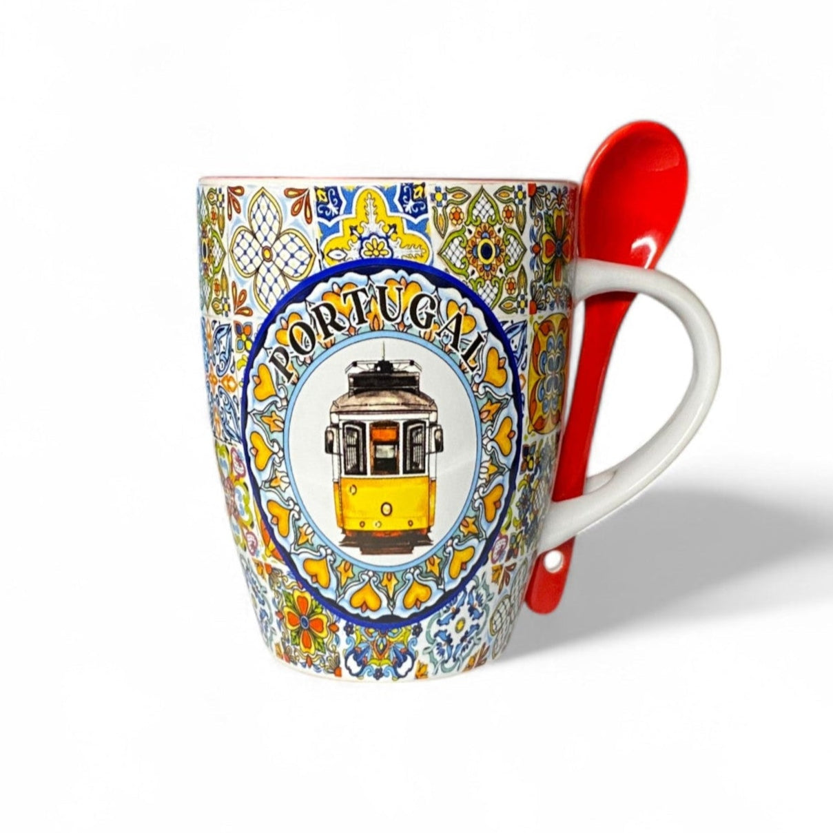 Mug with 'Portugal' and tram design, accompanied by a red spoon on a white background