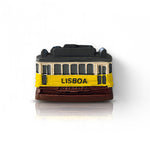 A 3D relief fridge magnet featuring the iconic yellow tram with 'LISBOA' written on the front, capturing the essence of Lisbon, Portugal.