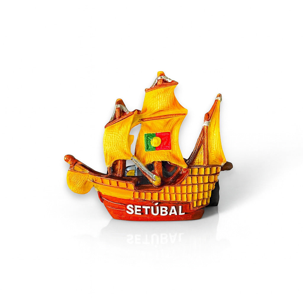 A polyresin magnet featuring a traditional Portuguese sailing ship with yellow sails and the Portuguese national flag, predominantly in orange and yellow colors with the name 'Setúul' visible.