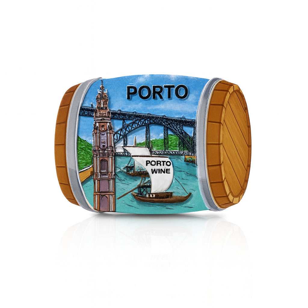 3D magnet shaped like a wine barrel featuring a rabelo boat on the Douro River, the Dom Luís I Bridge in the background, and the Clérigos Tower on the left, with the word "Porto" at the top