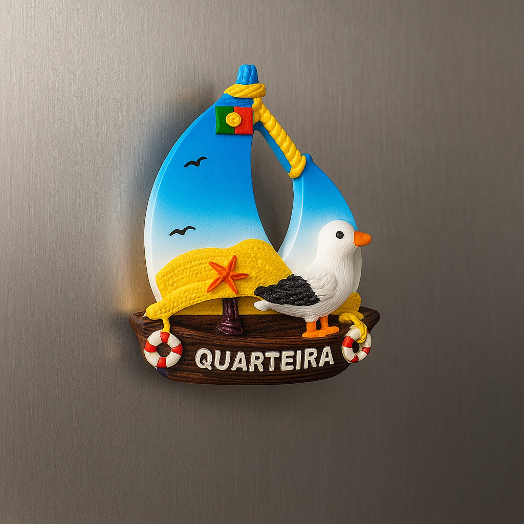Decorative magnet shaped like a sailboat with a bird on a metallic surface