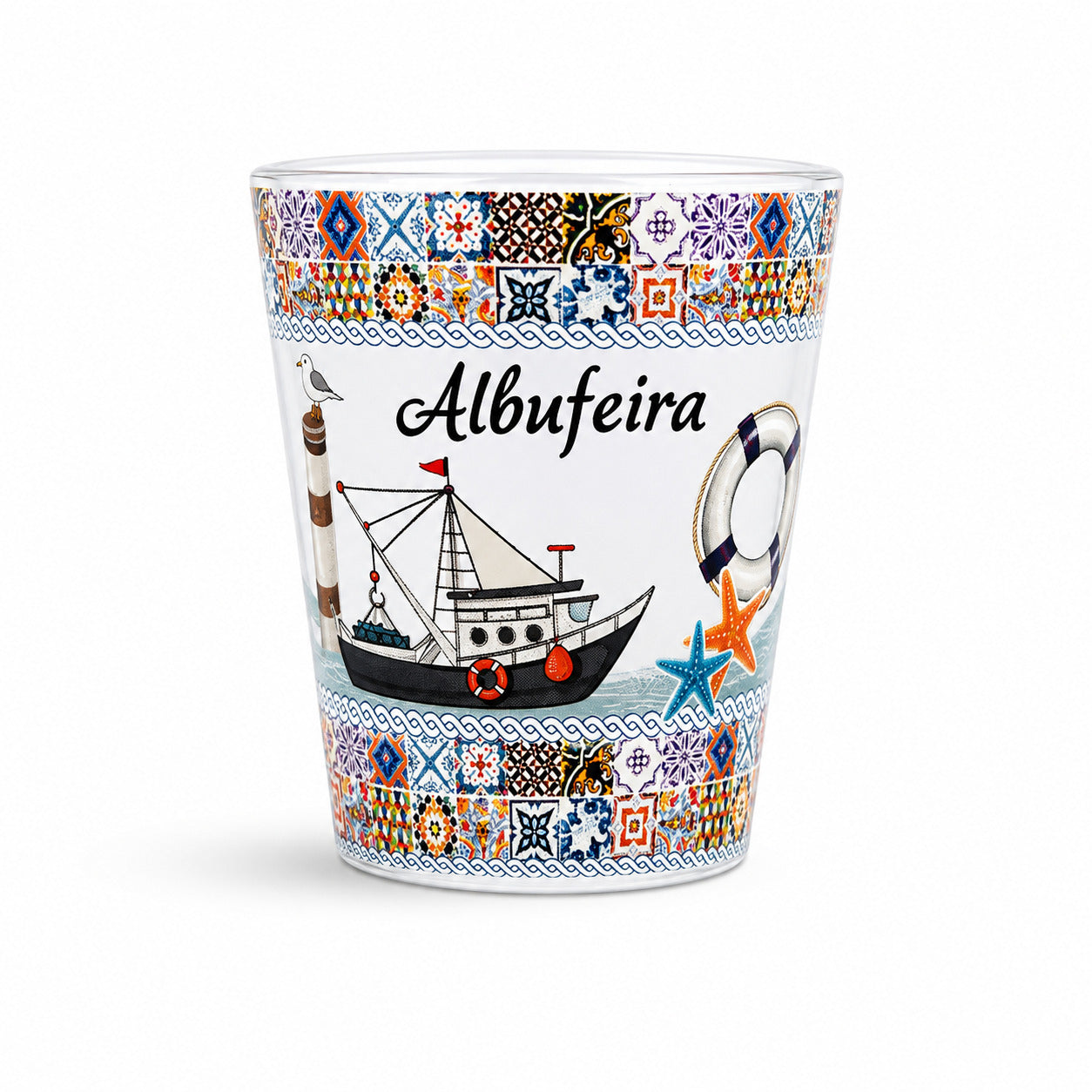 Studio image of Albufeira souvenir shot glass decorated with colorful Portuguese azulejo tiles, fishing boat illustrations, and Algarve coastal symbols