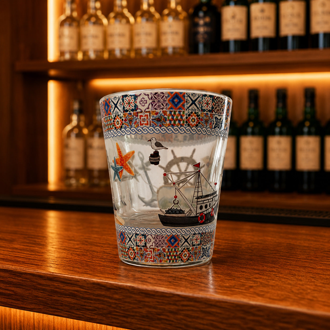 Decorative Albufeira shot glass with fishing boat illustration, anchor details, and vibrant Algarve-inspired Portuguese tile patterns