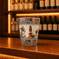 Albufeira Algarve souvenir shot glass featuring lighthouse artwork, nautical anchor illustration, starfish details, and colorful Portuguese azulejo borders