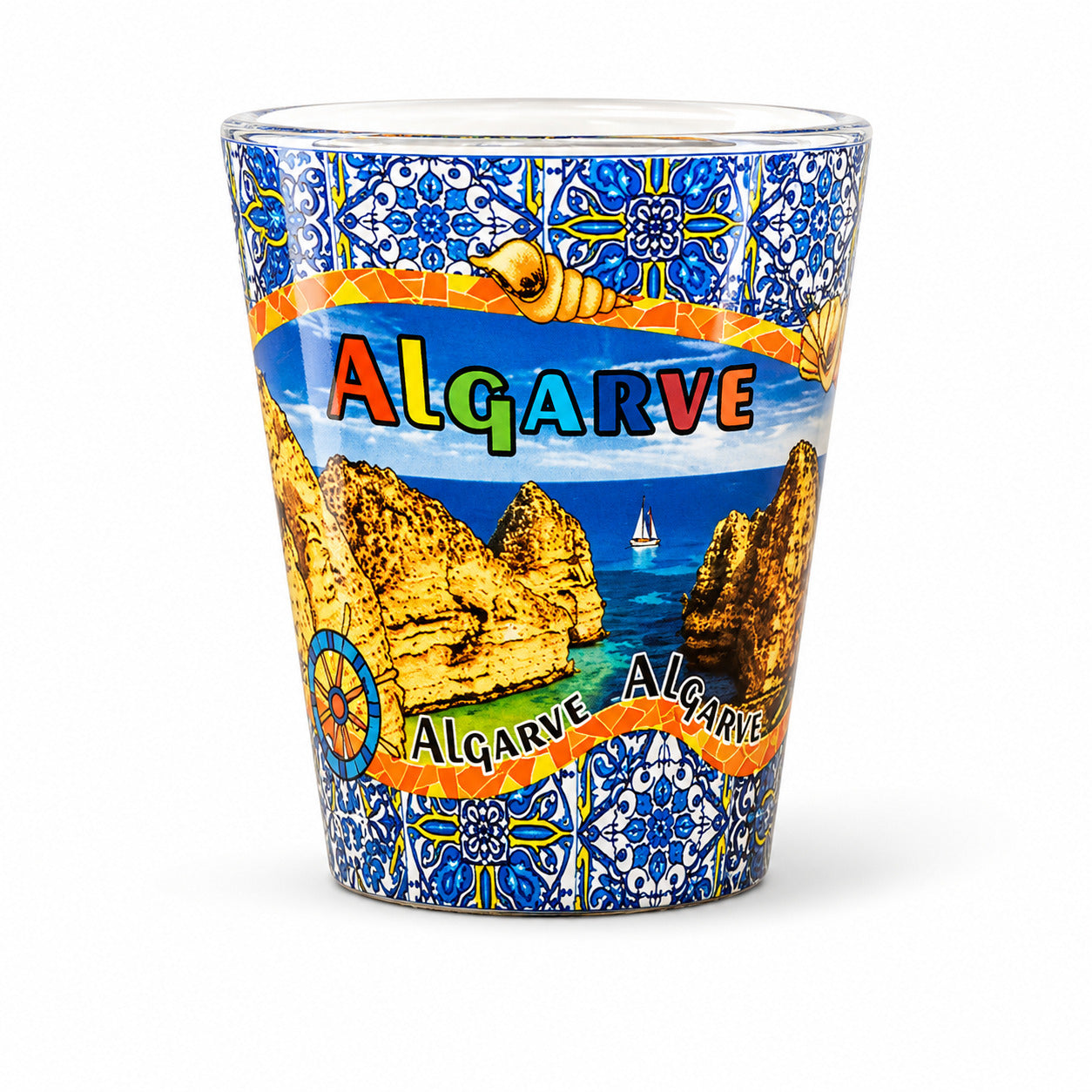 Algarve Portugal souvenir shot glass with coastal landscape illustration, blue Portuguese azulejo patterns, and ocean scenery isolated on white background.