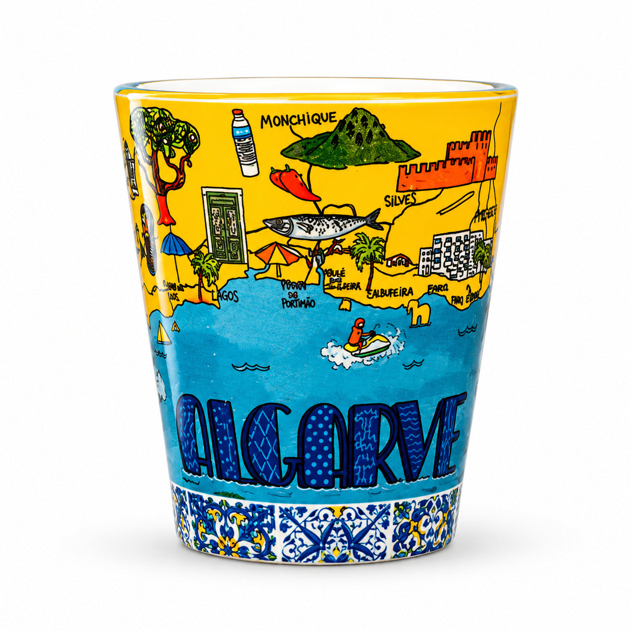 Algarve Portugal shot glass with detailed illustrated map design, coastal landmarks, and traditional azulejo border isolated on white background.