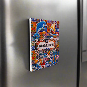 An eye-catching Algarve-themed magnet with a mosaic design showcasing a dolphin, sailboat, lighthouse, and other sea-themed elements. The word "Algarve" is boldly featured in the center, framed by detailed patterns and vivid colors, making it an ideal Portugal souvenir.