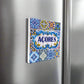 A square decorative tile adorned with detailed blue and yellow patterns framing the word "ACORES" in bold blue lettering. The design features traditional floral and geometric motifs, reflecting the classic Azorean or Portuguese style—an ideal souvenir from the Azores.