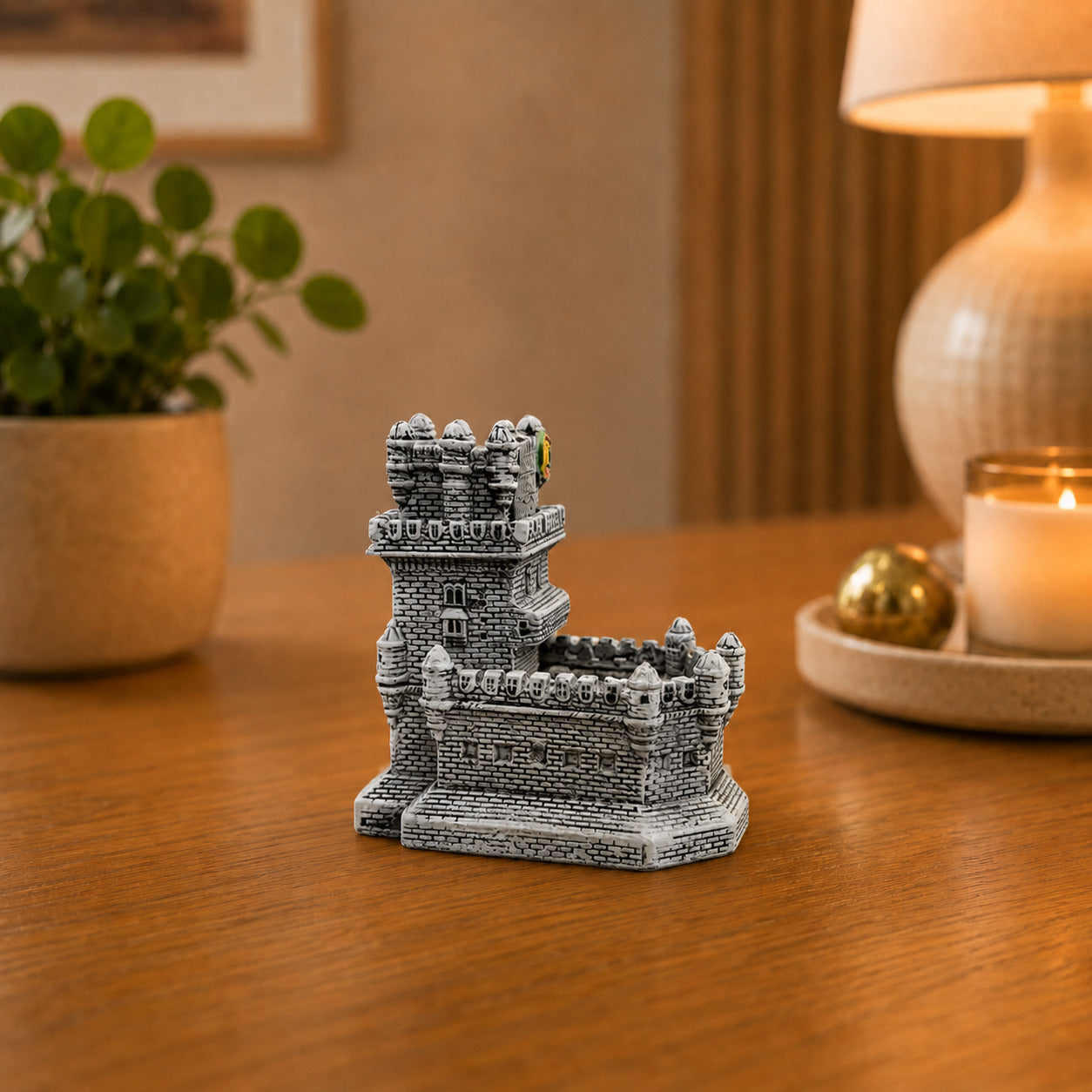 Rear view of a Belém Tower monument souvenir showcasing the intricate medieval fortress design and architectural details of one of Lisbon’s most famous landmarks.