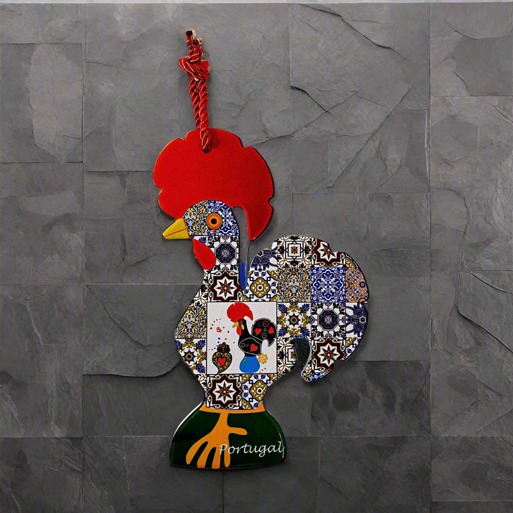 A vibrant wooden Barcelos rooster ornament adorned with a red comb and detailed mosaic patterns showcasing classic Portuguese motifs. It includes a red string for hanging, with "Portugal" written near the base, making it an ideal souvenir.