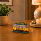 Front view of a Lisboa vintage tram souvenir collectible, showcasing the classic yellow tram design that symbolizes Lisbon and Portuguese heritage.