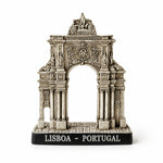 Front view of a Lisbon Arco da Rua Augusta monument souvenir, highlighting the ornate sculptures, columns, and decorative elements of this historic Portuguese landmark.