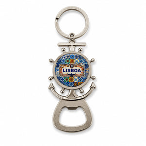 A silver keychain bottle opener, shaped like a ship's wheel and anchor, features a blue and yellow mosaic design with "Lisboa" in the center. This charming souvenir is perfect for any Lisbon enthusiast.