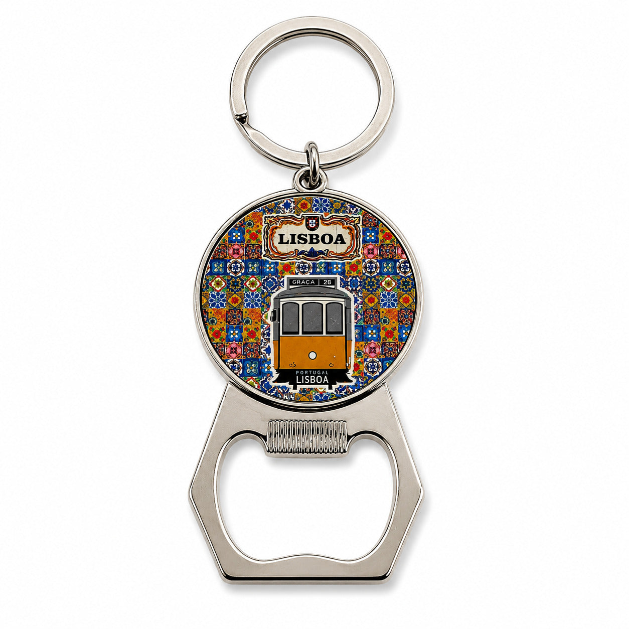 A keychain with a bottle opener attached. The round element shows a colorful illustration of a Lisbon tram with the word "Lisboa" at the top. This charming souvenir features a background pattern reminiscent of traditional Portuguese tiles.