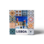 A colorful square tile magnet features a central image of Pena Palace in Lisbon, Portugal, surrounded by intricate, multicolored geometric and floral patterns. Below the palace image, the word "LISBOA" is prominently displayed alongside a charming depiction of a traditional tram.