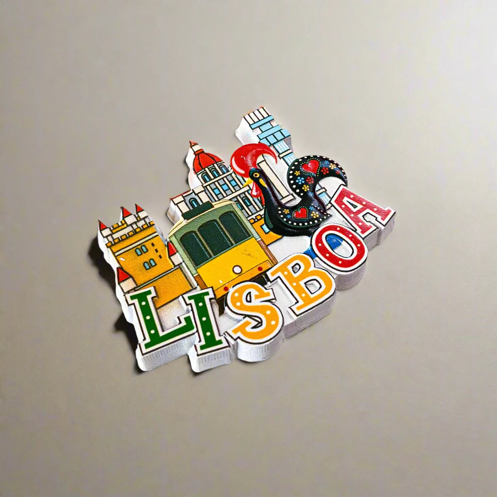 A charming illustration of Lisbon showcases colorful "LISBOA" letters at the bottom. Iconic elements include a classic yellow tram, a prominent red-roofed tower, and the famous Barcelos Rooster, making it an ideal souvenir from Portugal.