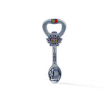 A multi-functional souvenir piece from Lisbon, Portugal, combines a bottle opener, magnet, and spoon. Decorated with the Portuguese flag, the crest of Lisbon, the word "Lisboa," and an engraved Lisbon landmark on the spoon end.