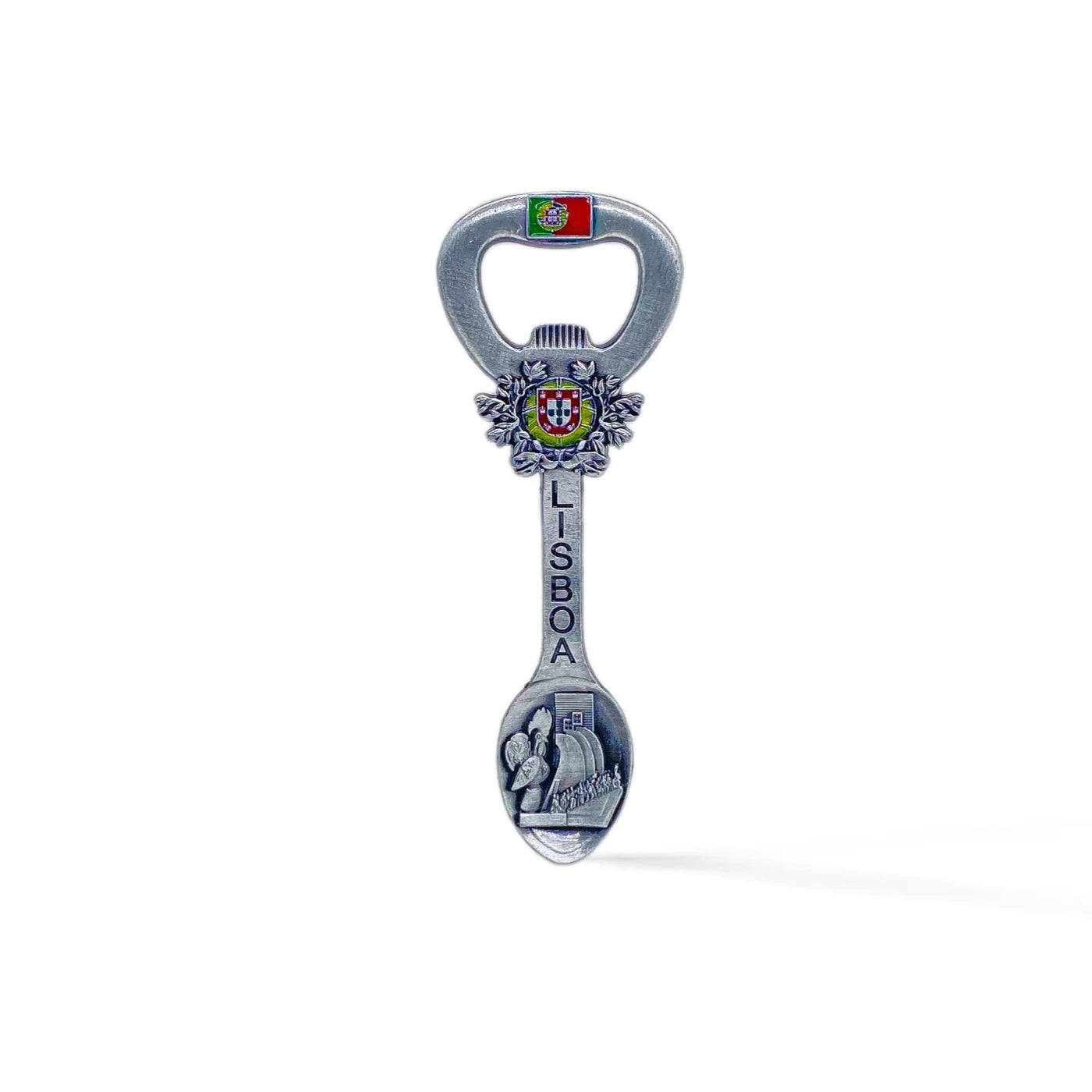 A multi-functional souvenir piece from Lisbon, Portugal, combines a bottle opener, magnet, and spoon. Decorated with the Portuguese flag, the crest of Lisbon, the word "Lisboa," and an engraved Lisbon landmark on the spoon end.