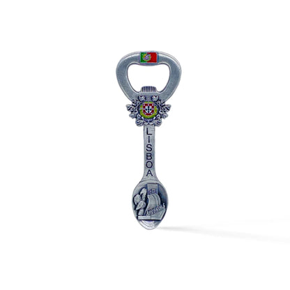 A multi-functional souvenir piece from Lisbon, Portugal, combines a bottle opener, magnet, and spoon. Decorated with the Portuguese flag, the crest of Lisbon, the word "Lisboa," and an engraved Lisbon landmark on the spoon end.