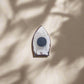 This boat-shaped souvenir magnet showcases "MADEIRA" at the top, with a charming scene of the island’s blue waters, boats, and cliffside houses. A lifebuoy is featured at the bottom, making it a perfect addition to any magnet collection or a fond reminder of your Madeira adventure.