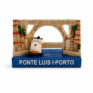 Porto Dom Luís I Bridge souvenir magnet isolated on a white background, depicting the iconic bridge, traditional riverside houses, Douro River, and a classic Port wine boat.
