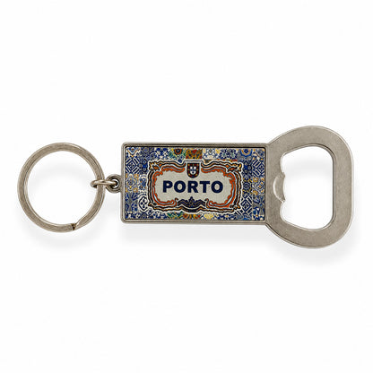 A rectangular keychain with a bottle opener at the bottom and a metal ring at the top. This vibrant souvenir features a colorful, intricate design with the word "Porto" in the center, celebrating the charm of this beautiful city in Portugal.