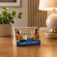 Decorative Porto magnet featuring the famous Dom Luís I Bridge, Ribeira district architecture, and a traditional wine transport boat in a realistic miniature design.