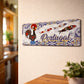 Portugal metal souvenir sign mounted on a wall featuring Barcelos rooster, decorative sardines and traditional azulejos patterns