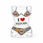 Transparent Portugal bikini style shot glass with traditional Portuguese tile artwork and I Love Portugal print isolated on white background.