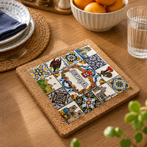 Portugal cork base with colorful ceramic azulejo tile displayed on a wooden dining table with traditional Portuguese-inspired décor.