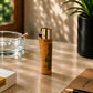 Portugal cork Clipper lighter featuring a map of Portugal with regional landmarks and cultural icons displayed on a desk in a warm lifestyle setting with natural lighting.