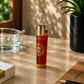 Portugal cork Clipper lighter featuring the Portuguese flag and national coat of arms displayed on a desk with natural lighting in a lifestyle setting