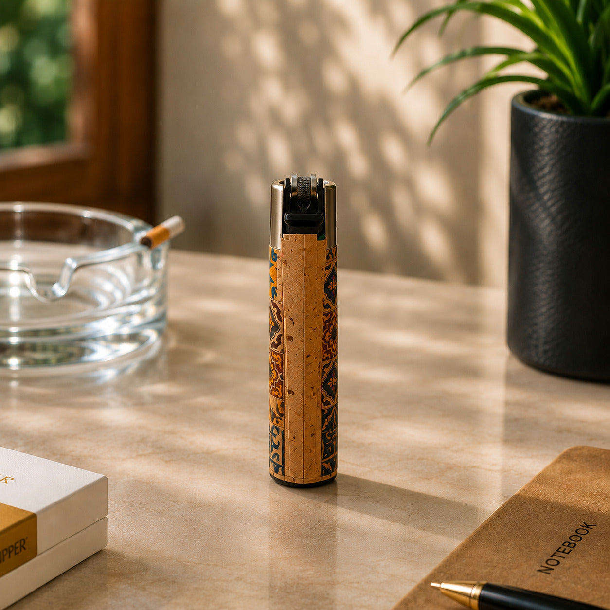 Rear view of a Portugal cork Clipper lighter featuring traditional Portuguese azulejo tile artwork and natural cork finish displayed in a warm lifestyle setting.