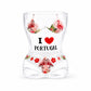Portugal flamingo bikini style souvenir shot glass with tropical floral artwork and transparent glass body isolated on white background.