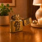 Open vintage Portugal petrol lighter displaying the classic ignition mechanism and engraved Portugal map design.