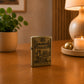 Vintage Portugal Zippo style petrol lighter featuring embossed Portuguese monuments, traditional architecture, and antique brass finish.