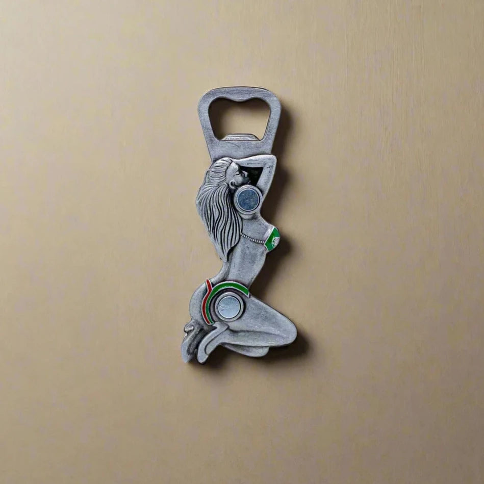 A metallic bottle opener shaped like a Portuguese girl kneeling with her hands behind her head. She is wearing a bikini decorated with the colors and emblem of Portugal, with "Portugal" written at the top. The opener also includes a magnet on the back, allowing for convenient storage on any metal surface.