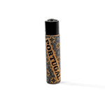 A lighter with a design featuring intricate patterns and the word "PORTUGAL" written vertically along the side. The lighter has a black top, a decorative base with an orange and black pattern reminiscent of traditional cork designs. The background is plain white.
