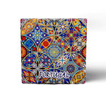 A vibrant and intricate ceramic tile design featuring various geometric and floral patterns in vivid colors, predominantly blue, yellow, and red. The word "PORTUGAL" is prominently displayed in white against the colorful background, making it a perfect souvenir for any travel enthusiast or addition to a cork coaster collection.