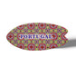 Featuring a colorful mosaic design inspired by Portuguese azulejo tiles, this oval ceramic piece displays the word "PORTUGAL" in bold blue uppercase letters at its center. It rests on a cork base, with a faint shadow cast on the white background.
