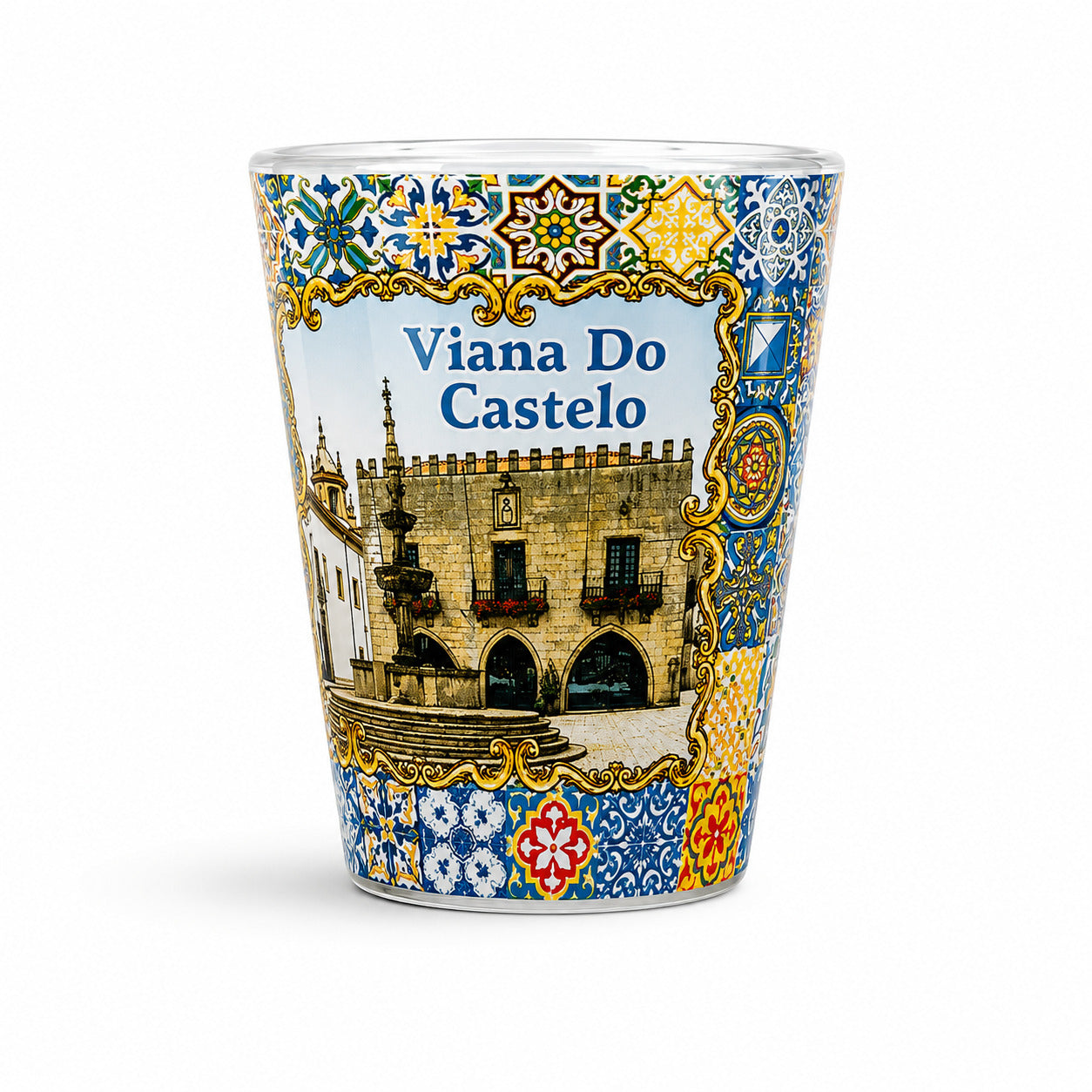 Studio image of Viana do Castelo shot glass souvenir decorated with historic city landmarks and traditional Portuguese tile patterns