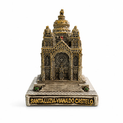 Front view of the Santa Luzia Basilica miniature souvenir from Viana do Castelo isolated on a white background, featuring its iconic architecture and detailed façade.