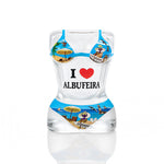 Albufeira souvenir shot glass shaped like a bikini-clad female torso with “I love Albufeira” and beach-themed illustrations in a playful design.