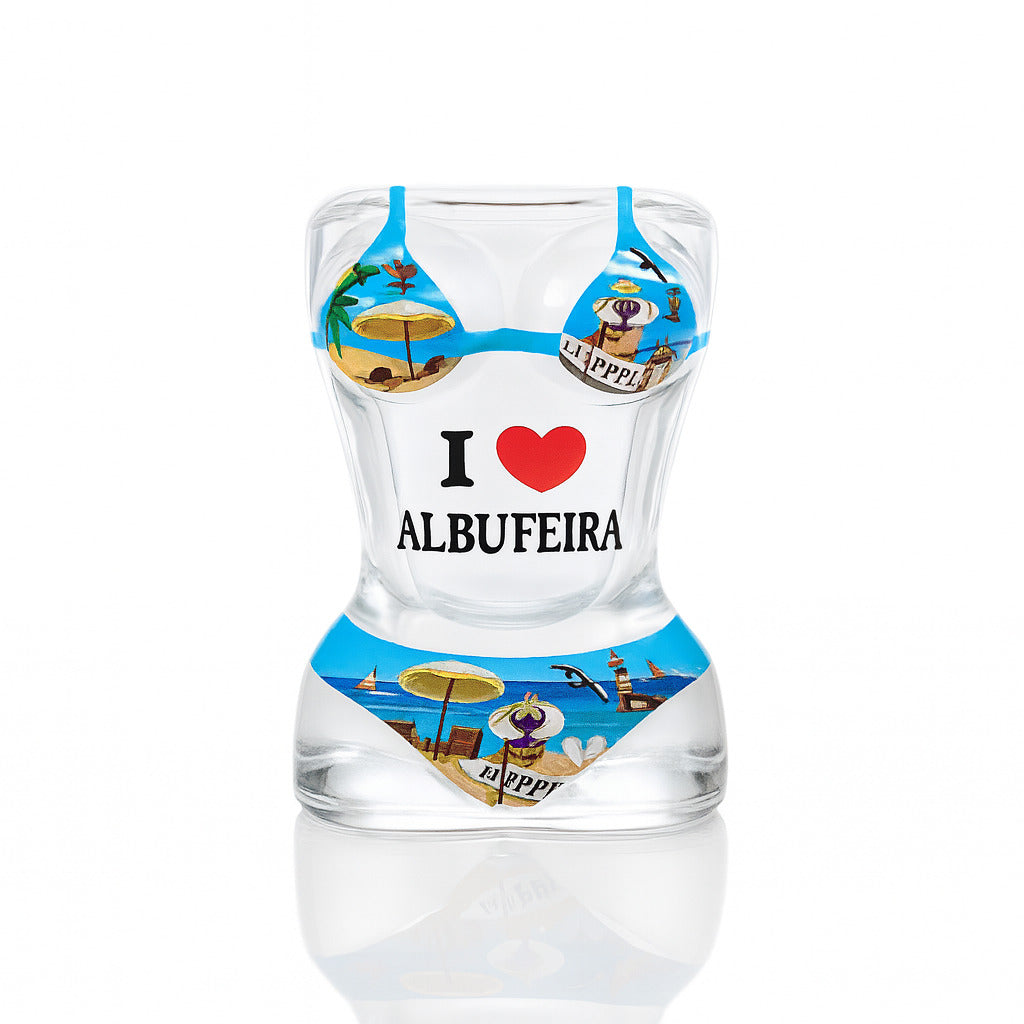 Albufeira souvenir shot glass shaped like a bikini-clad female torso with “I love Albufeira” and beach-themed illustrations in a playful design.