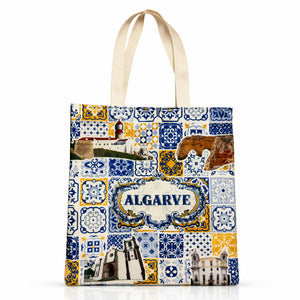 Front view of Algarve cotton tote bag souvenir with azulejos tile pattern and Algarve text.