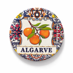 Algarve souvenir ceramic coaster featuring orange branch and traditional azulejos patterns